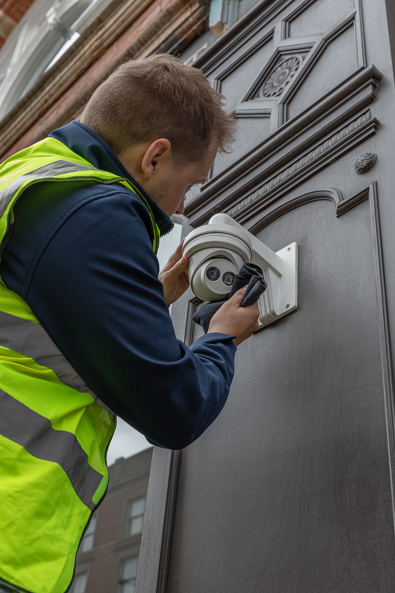 man installing camera